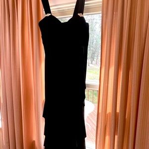 Black formal gown with ruffles. Size 4.